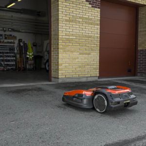 a robot mower parked at its maintenance point