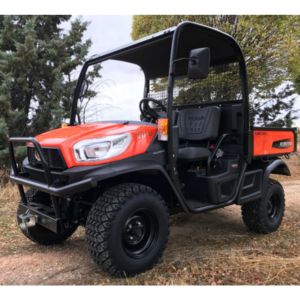the Kubota RTV-X1110 Utility Vehicle parked in front of some trees