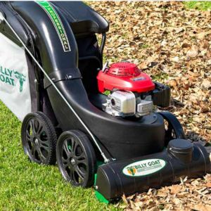 a Billy Goat vac collector picking up leaves off a lawn