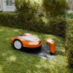 a STIHL iMow leaving its docking station