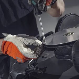 a man servicing garden machinery