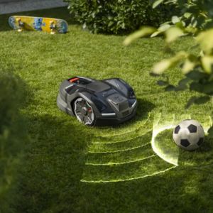 a digitally enhanced image using wavy lines to show a Husqvarna Automower avoiding a football
