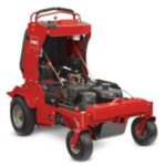 the Toro 24-Inch Petrol Stand-On Aerator against a white background