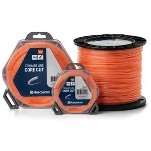 3 rolls of orange Husqvarna Core Cut Trimmer Line against a white background