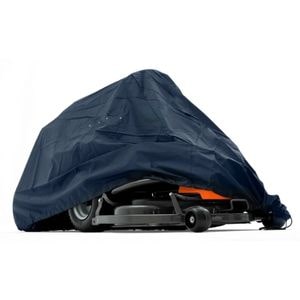 a black protective cover draped over a Husqvarna ride-on mower 