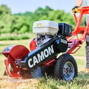 a close up of the Camon SG30 Stump Grinder in a field