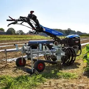 the BCS 780HY PowerSafe® Hydrostatic Petrol Two Wheel Tractor parked near the edge of a ploughed field