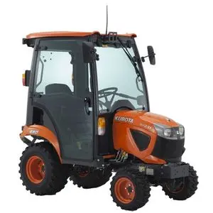 the Kubota BX231 Compact Tractor with driver's cab fitted, against a white background
