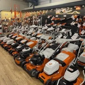 a large selection of STIHL lawnmowers and other STIHL tools at a Ron Smith & Co showroom